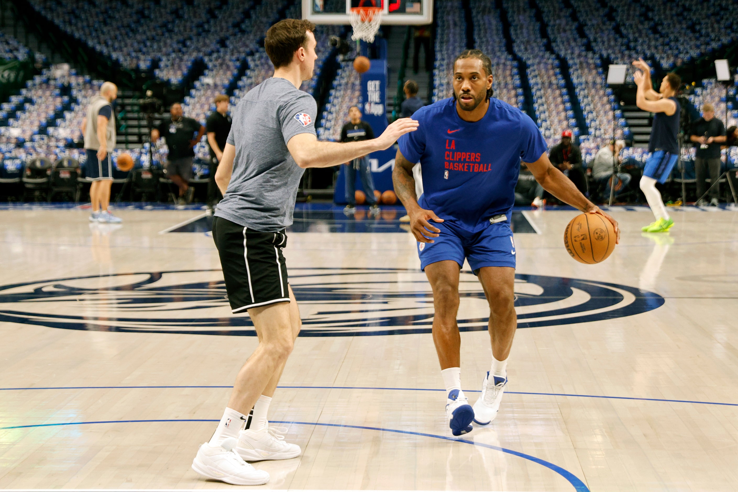 LA Clippers forward Kawhi Leonard warms up before Game 3 of an NBA basketball first-round...