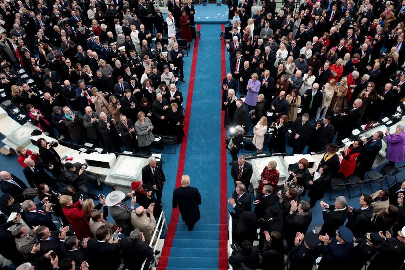 Gentry Beach (far right, left of a woman in purple coat) was in attendance as...