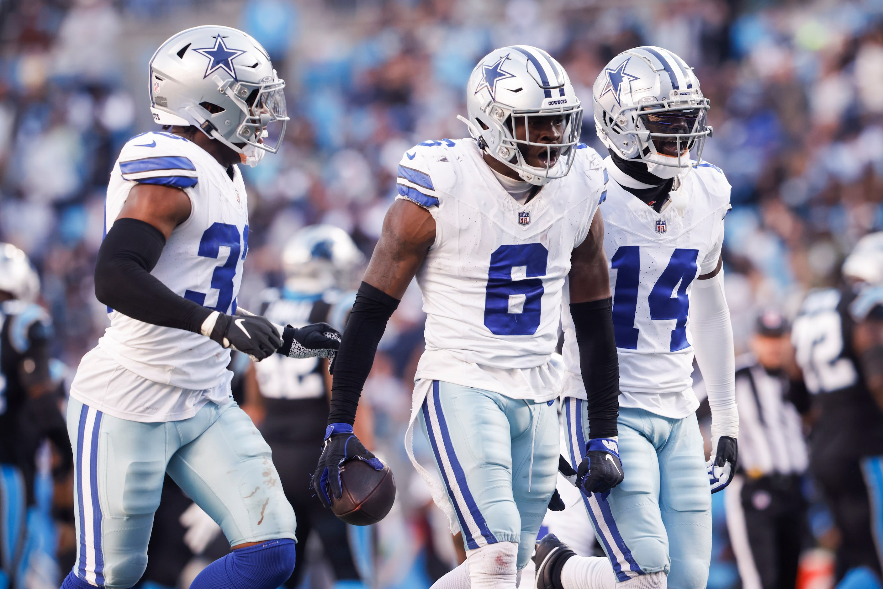 Dallas Cowboys safety Donovan Wilson (6) celebrates with Dallas Cowboys linebacker Damone...