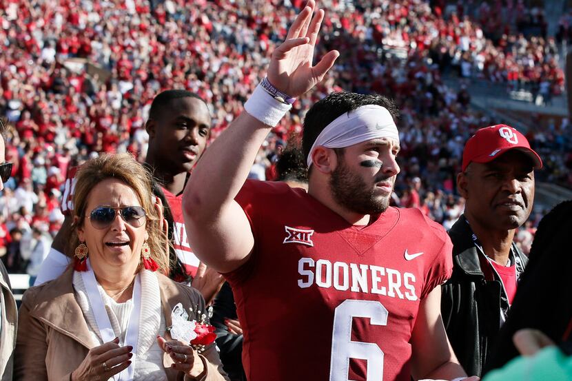 Oklahoma quarterback Baker Mayfield (6) waves to the crowd as he is announced on Senior Day,...