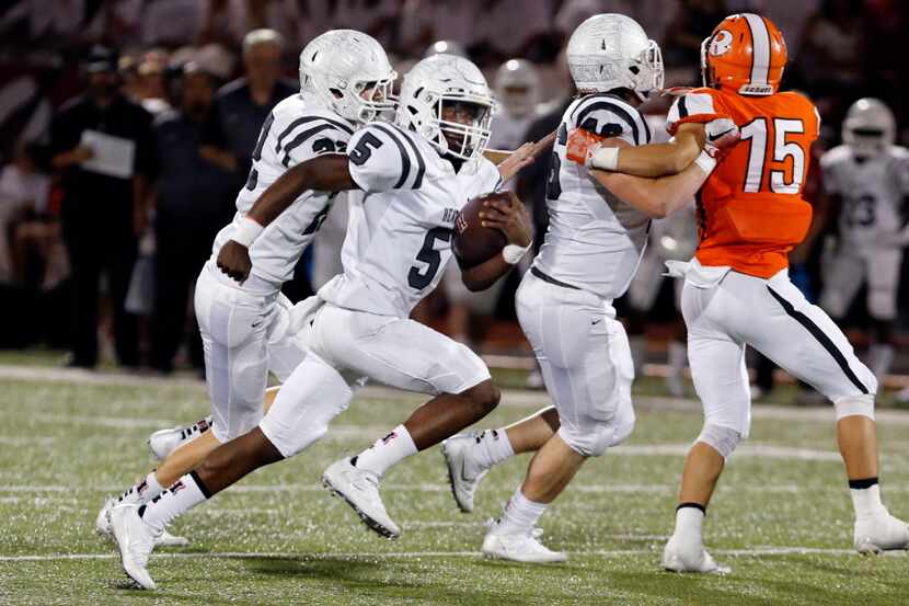 Rockwall Heath's Tyrus Fort (5) scampers to the end zone for Hawk's second TD during the...