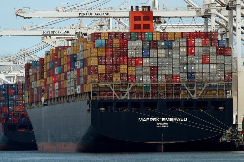 The container ship Maersk Emerald is unloaded at the Port of Oakland, Calif.