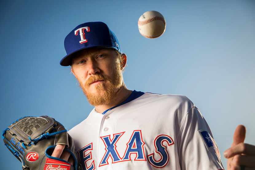 Texas Rangers pitcher Jake Diekman poses for a photo during Spring Training picture day at...