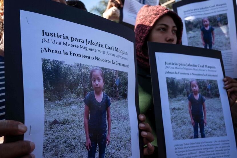Central American migrants in Tijuana, Mexico, hold a demonstration following the death of...
