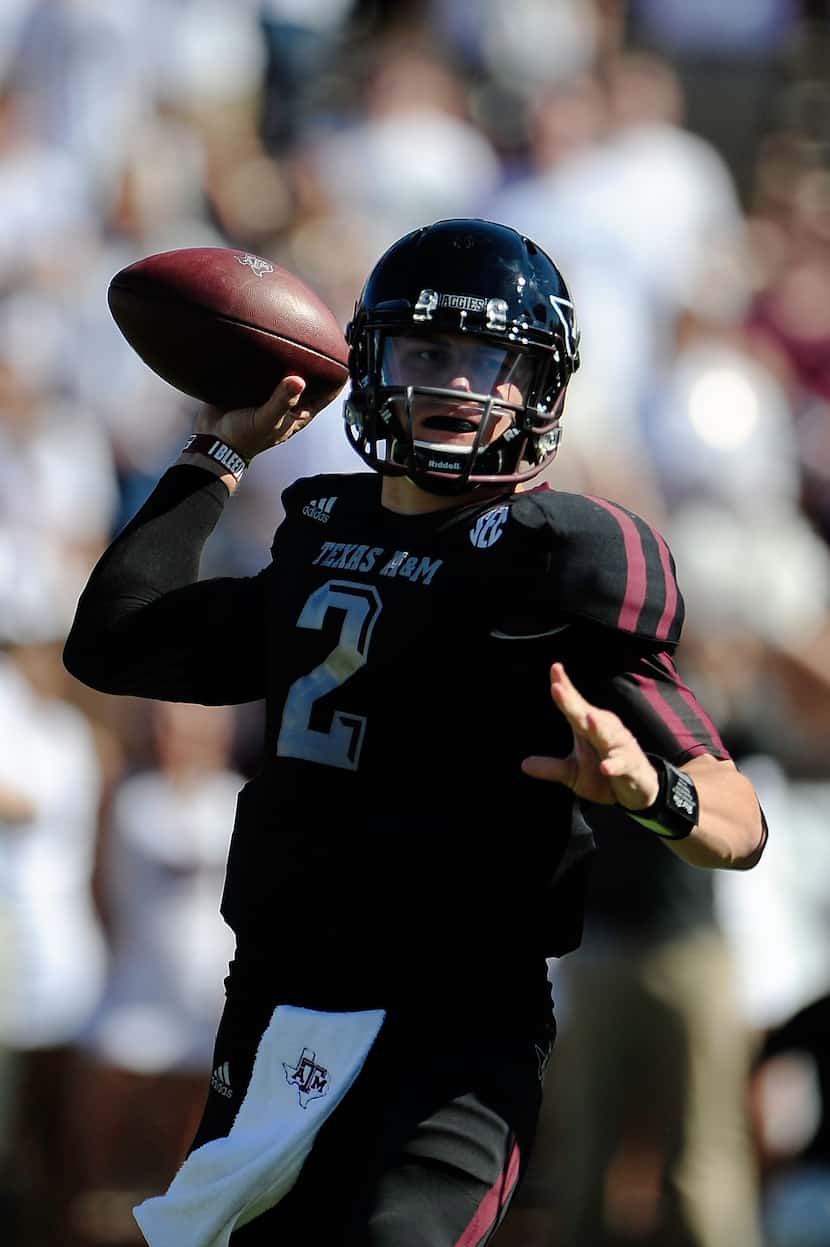 STARKVILLE, MS - NOVEMBER 03:  Johnny Manziel #2 of the Texas A&M Aggies drops back to pass...
