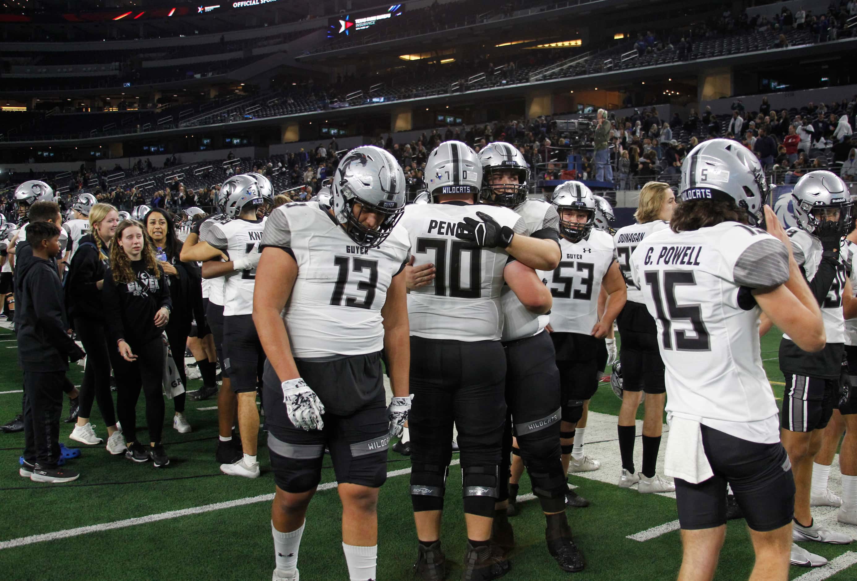 Denton Guyer players react after suffering a 40-21 loss to Austin Westlake. The two teams...