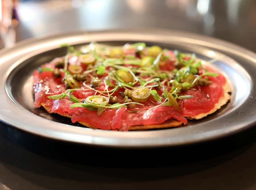 The Tuna Pizza at Kaiyo in Dallas is a playful addition to the menu.