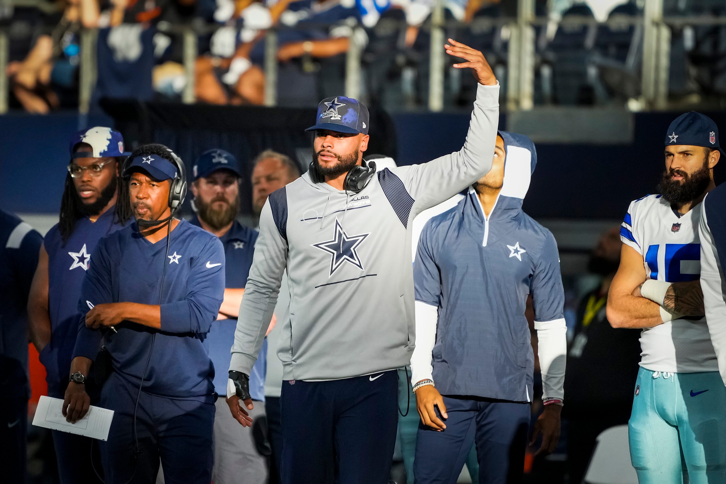 Dallas Cowboys quarterback Dak Prescott encourages the crowd to get louder from the...