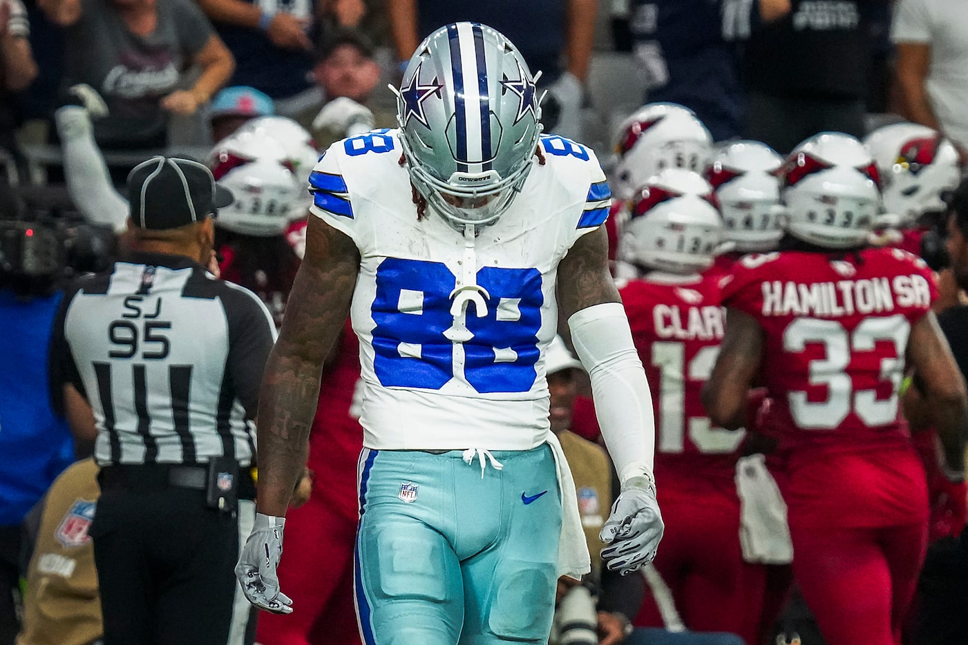 Dallas Cowboys wide receiver CeeDee Lamb (88) walks off the field as Arizona Cardinals...