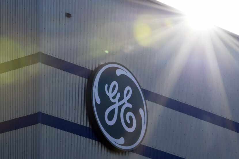 n this file photo, the GE logo is seen at a factory western France. General Electric on...