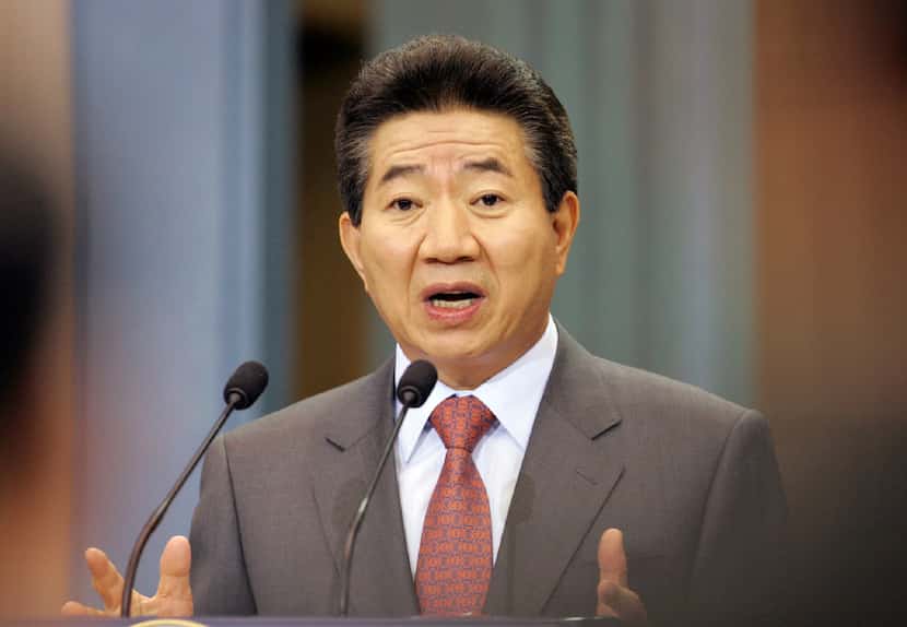 In this Nov. 27, 2007 file photo, South Korean President Roh Moo-hyun delivers a speech to...