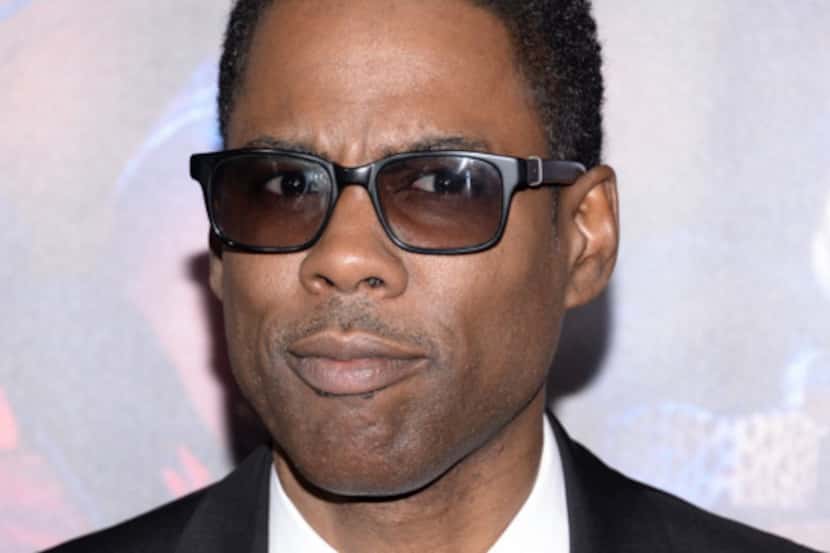 Actor/director Chris Rock attends the premiere of "Top Five" at the Ziegfeld Theatre on...