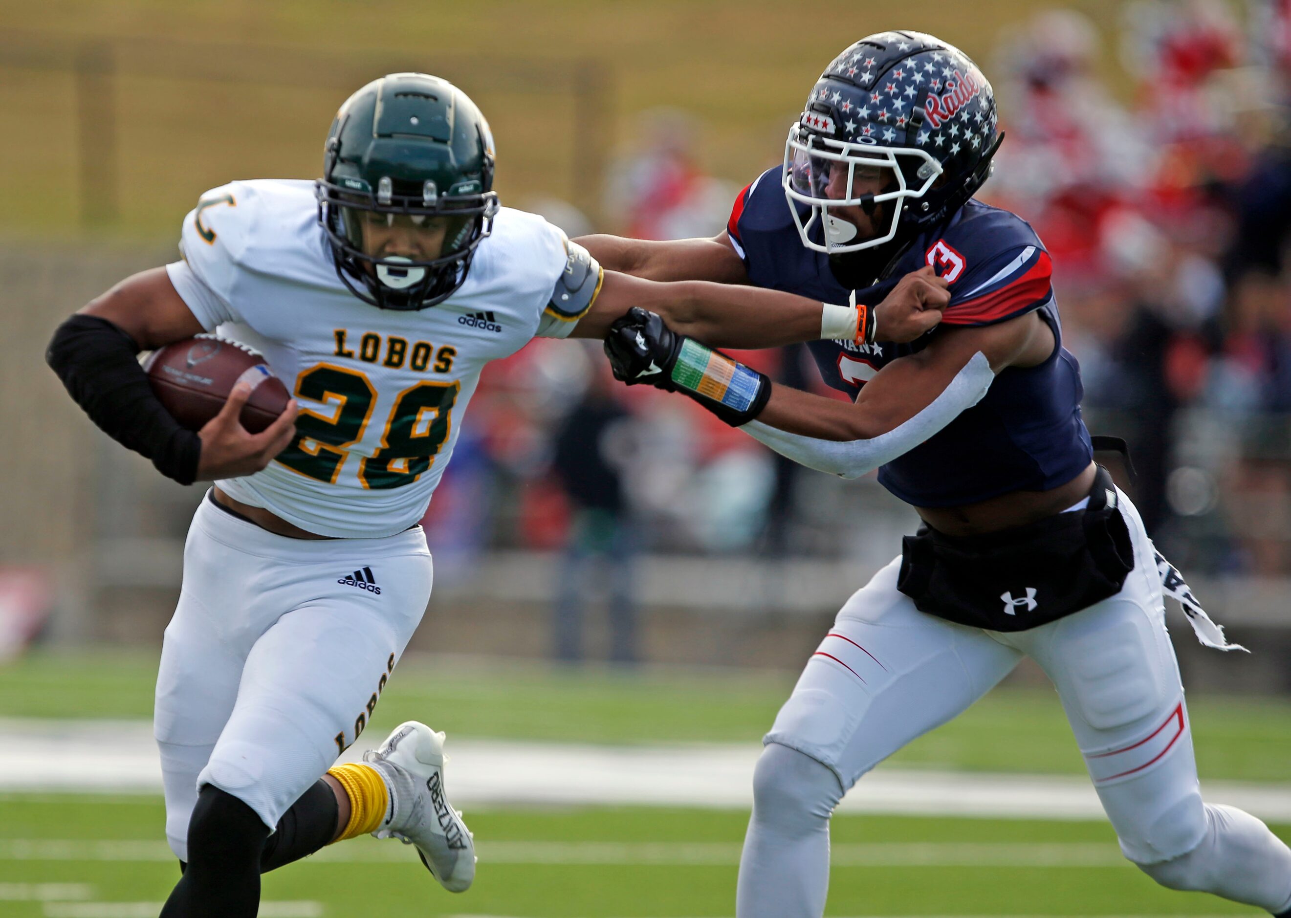 Longview RB Taylor Tatum (28) is stopped by Denton Ryan DB Austin Jordan (3) during the...