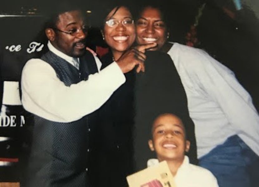 Marcus Bell Jr. (front) and his mother, Donna Fields (center), in a photo from about 2003...