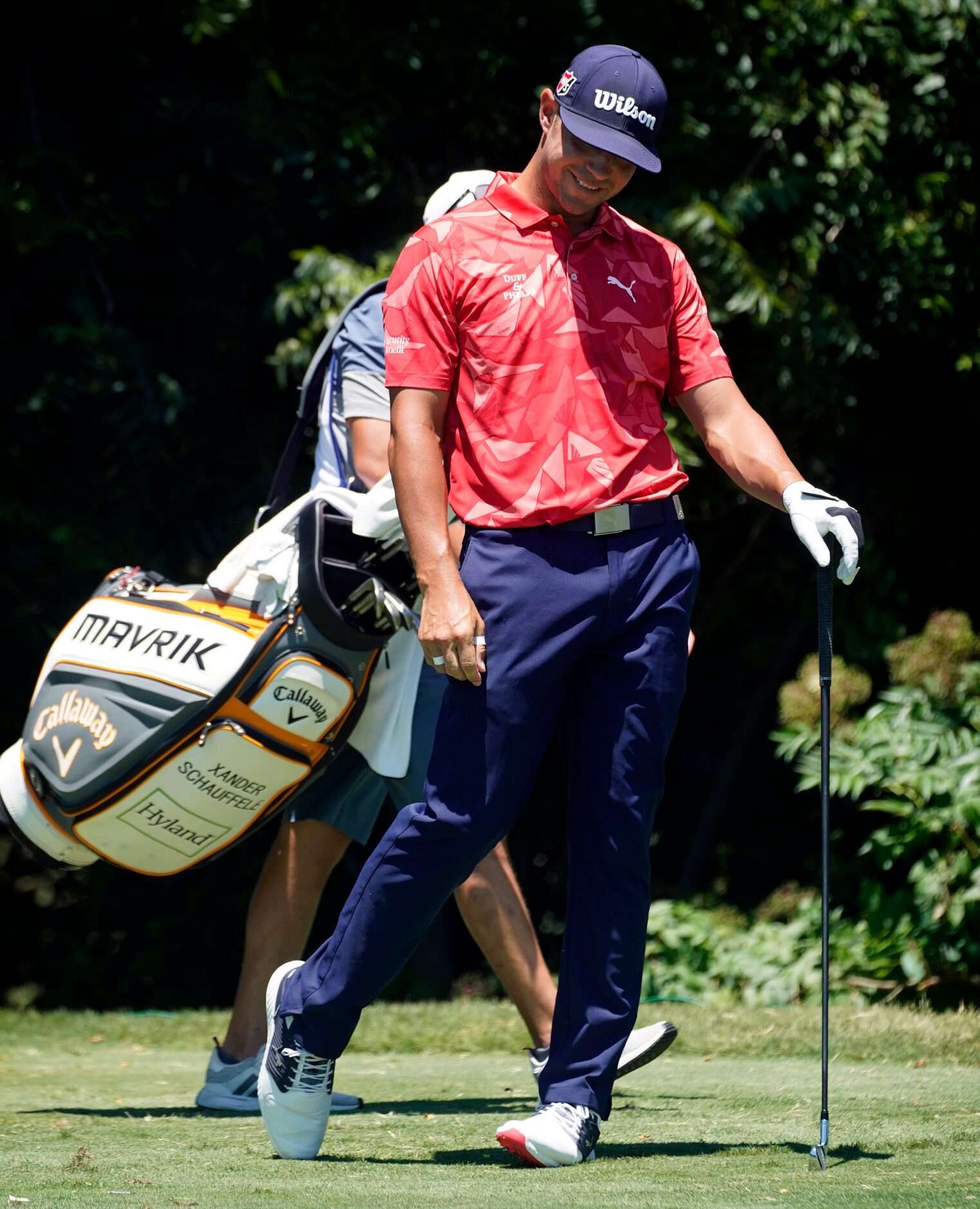 PGA Tour golfer Gary Woodland reacts to his tee shot on No. 9 during the final round of the...