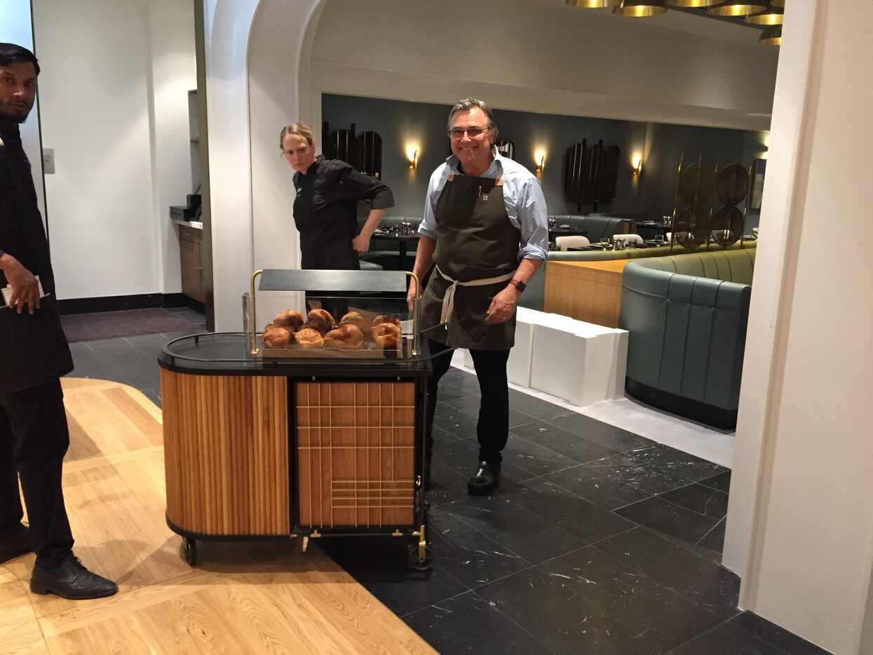 Neiman Marcus executive chef Kevin Garvin with his new popover cart in the Zodiac restaurant...