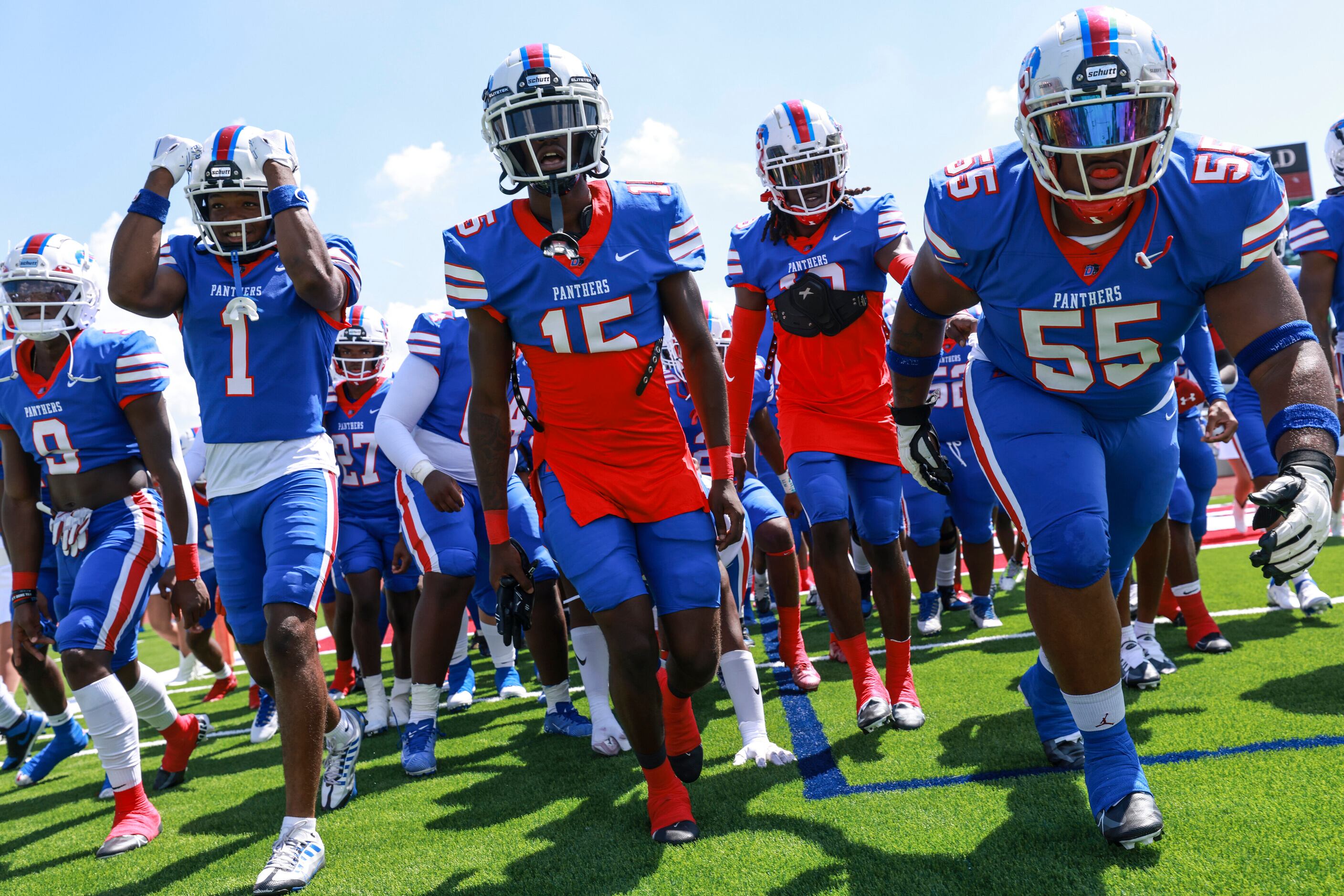 Duncanville High School players walk onto the field, Saturday, September 3, 2022, at Herman...