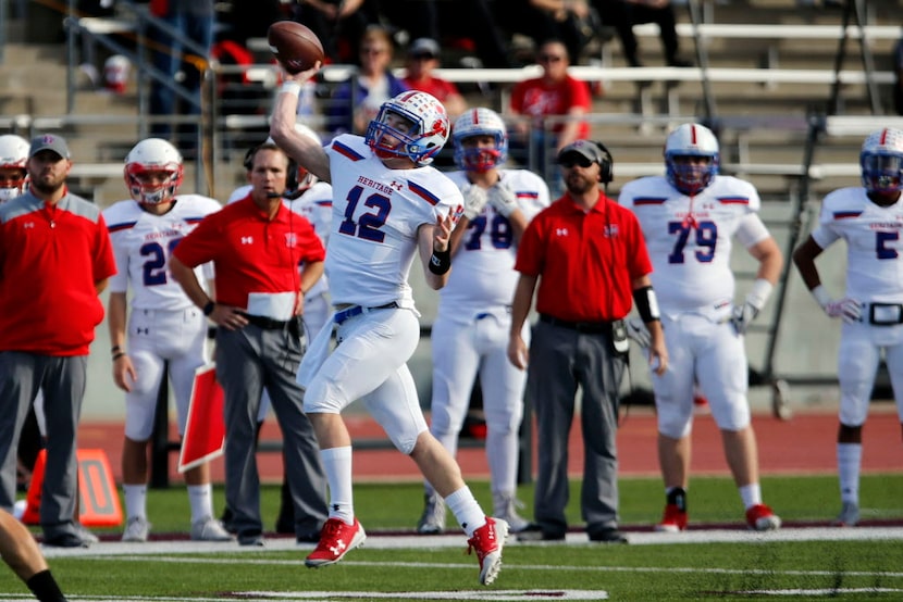 Midlothian Heritage QB Landon Ledbetter (12) throws a pass on the run during the Class 4A ...