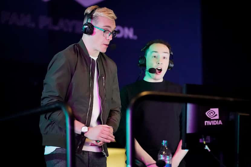 Announcers Brennon Hook (left) and Josh Wilkinson call a Overwatch League match between the...