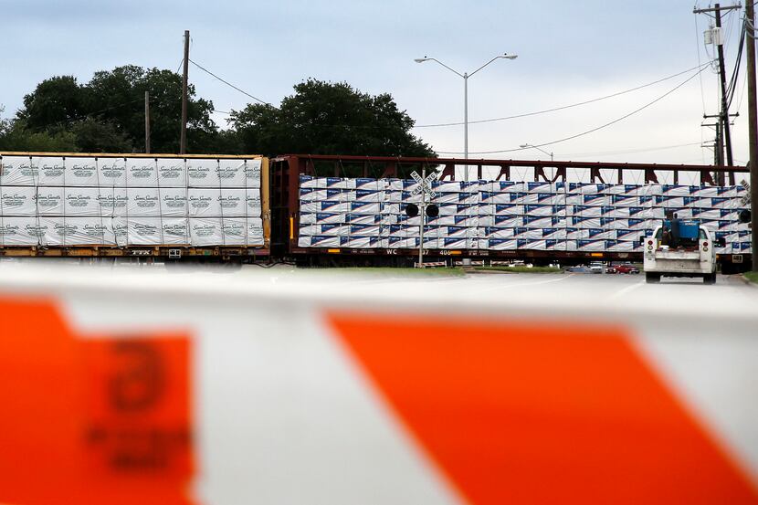 A train derailed near the intersection of South Haskell and Beeman avenues in Dallas on Monday.