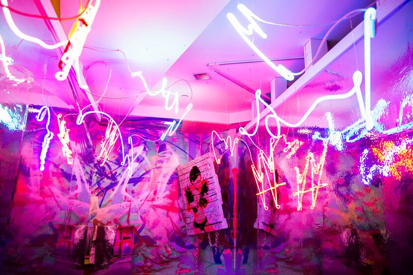 Neon and bright spray paint are the hallmarks of many of the rooms at Psychedelic Robot, a...