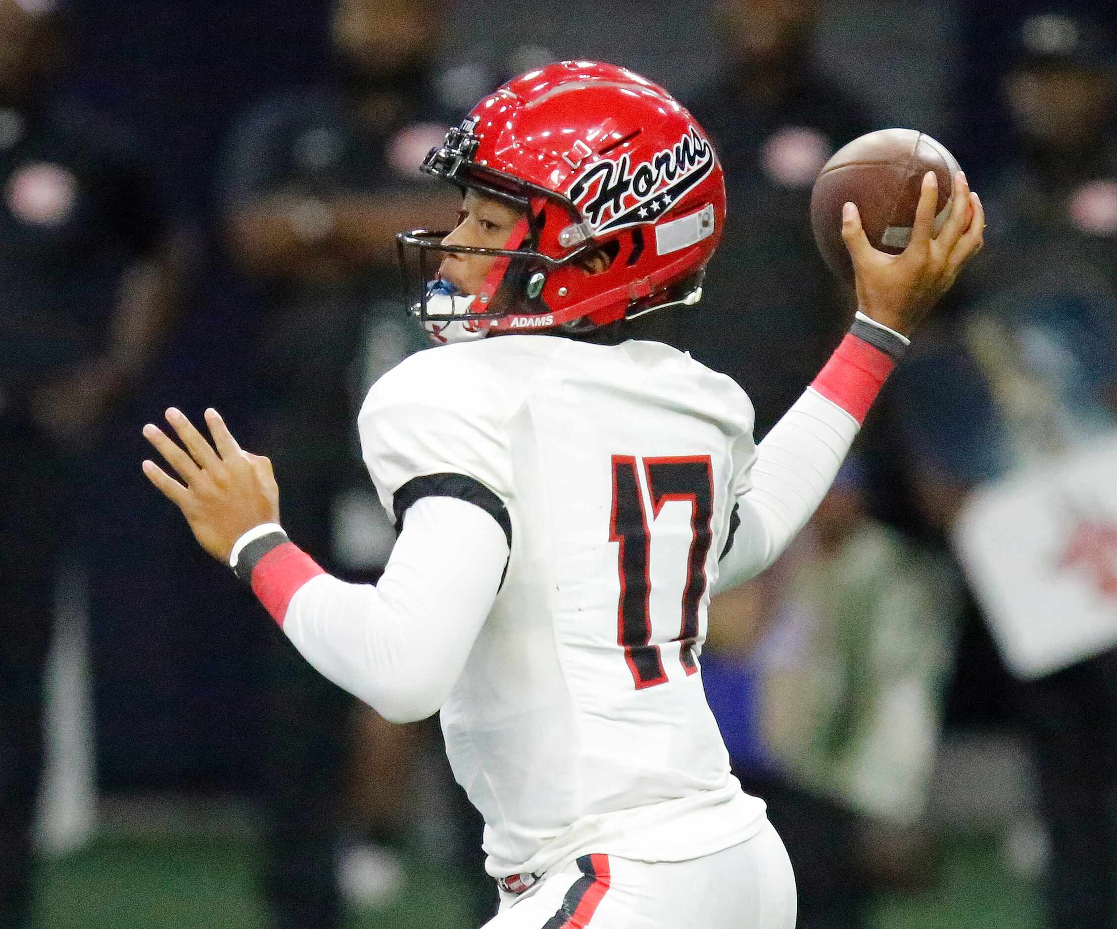 Cedar Hill quarterback Anthony Edwards (17) throws a pass during the first half as Rockwall...