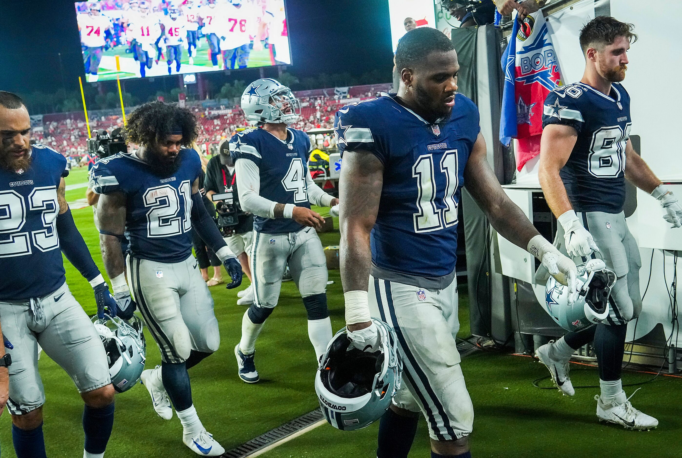 Dallas Cowboys linebacker Micah Parsons (11), running back Ezekiel Elliott (21), quarterback...