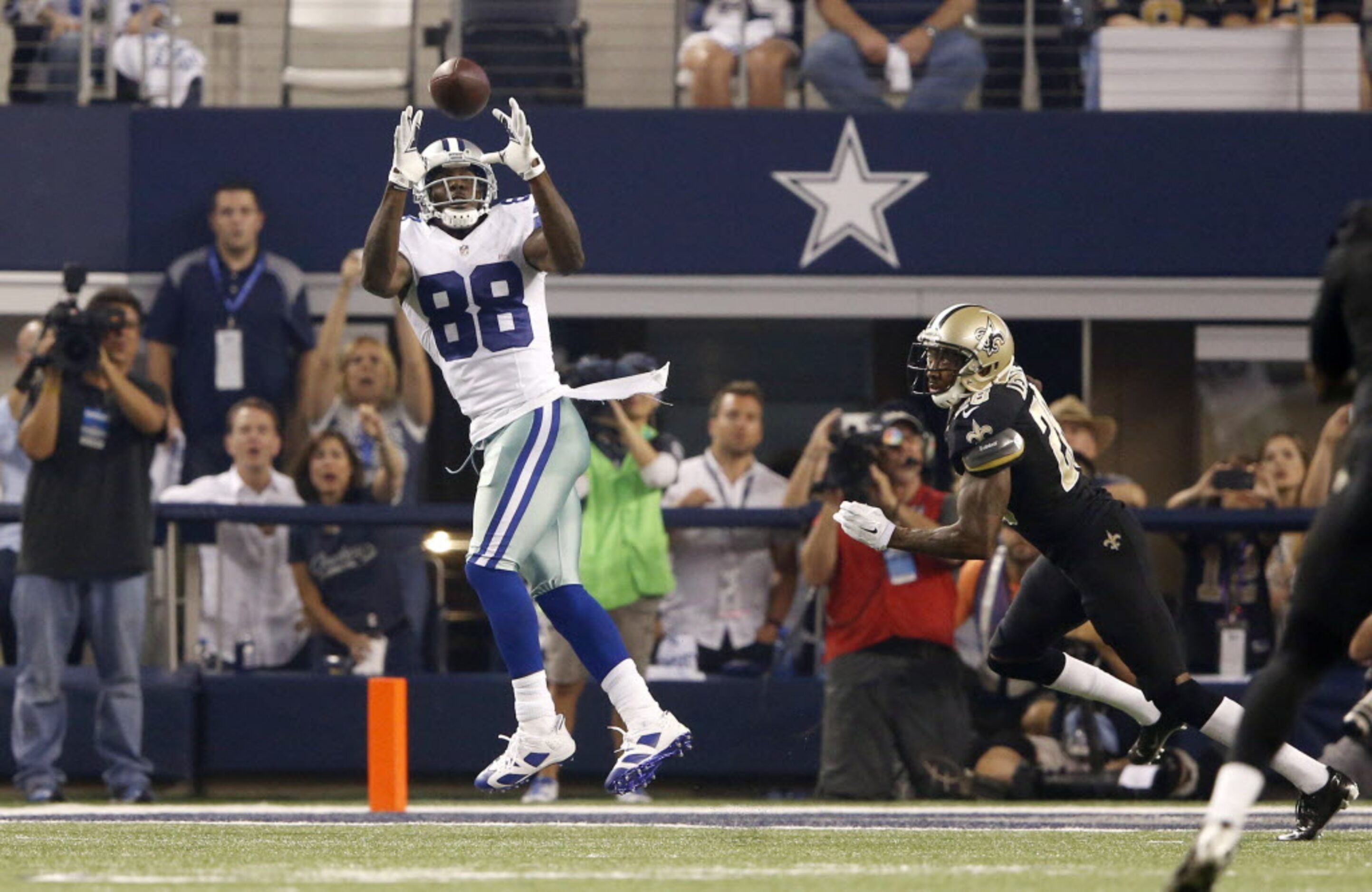 Dallas Cowboys wide receiver Dez Bryant (88) prepares to catch  pass for a touchdown in...