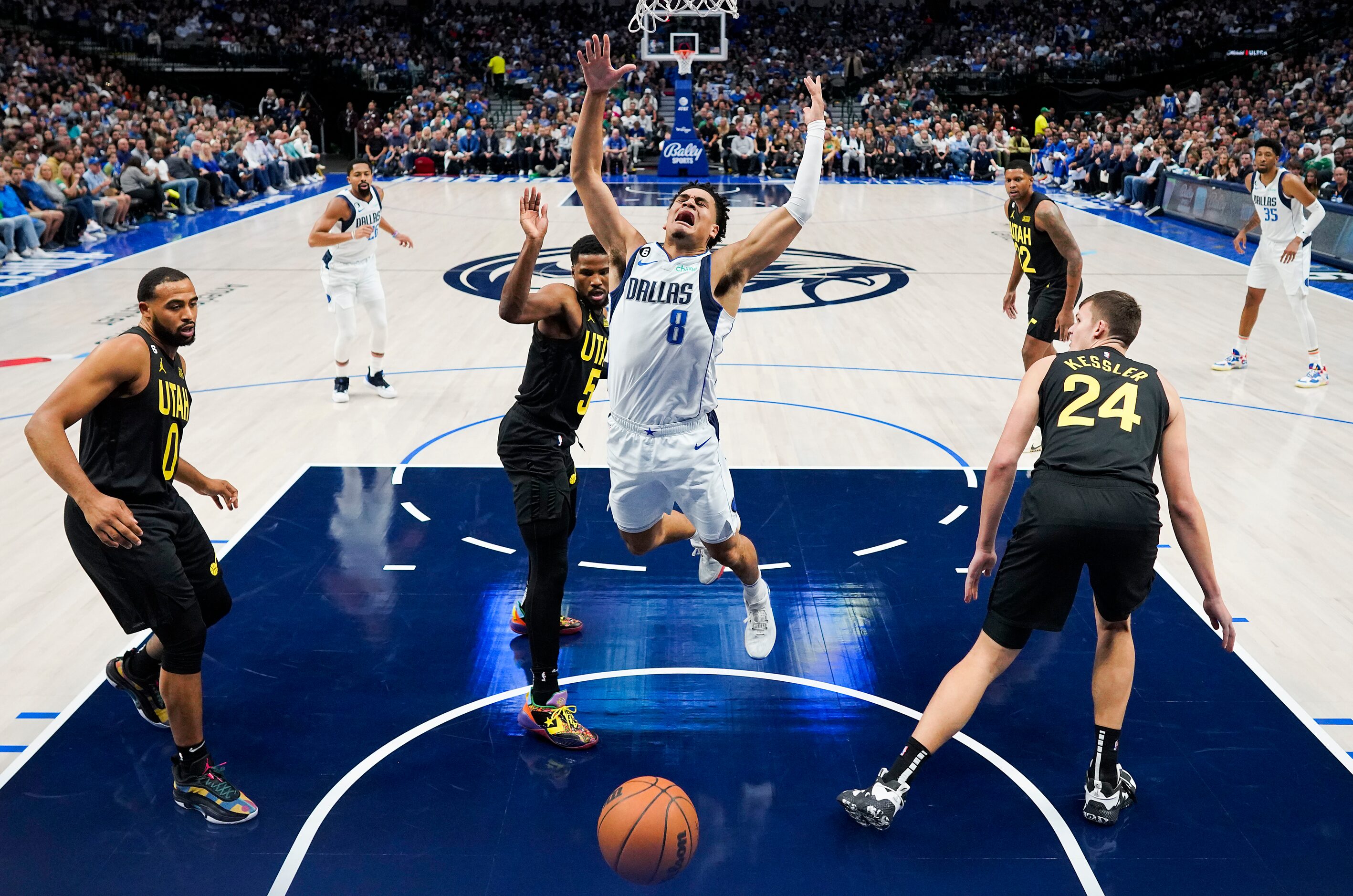 Dallas Mavericks guard Josh Green (8) loses the ball as he is fouled by Utah Jazz guard...