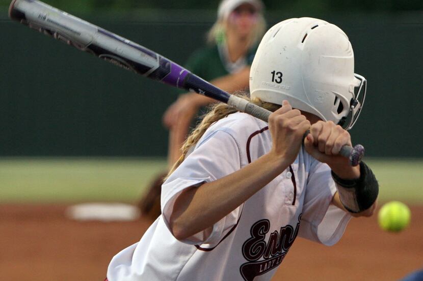 Ennis batter Kinsey Skroh (13) watches a pitch in from Mesquite Poteet pitcher Madison...
