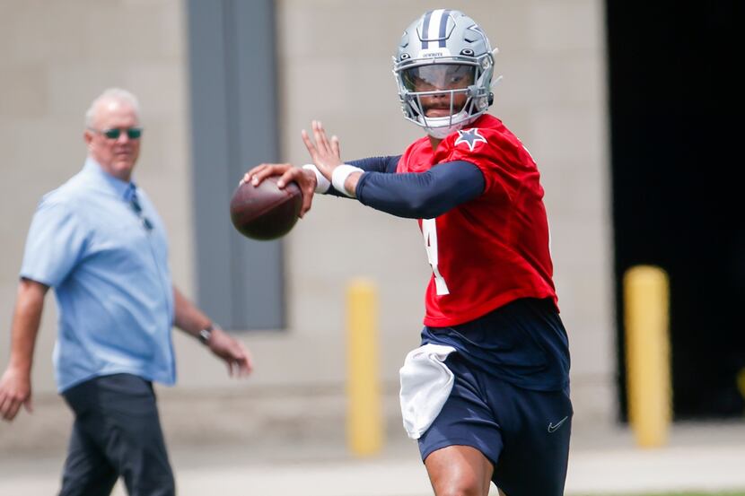 Dallas Cowboys CEO Stephen Jones watches as Dallas Cowboys quarterback Dak Prescott (4)...