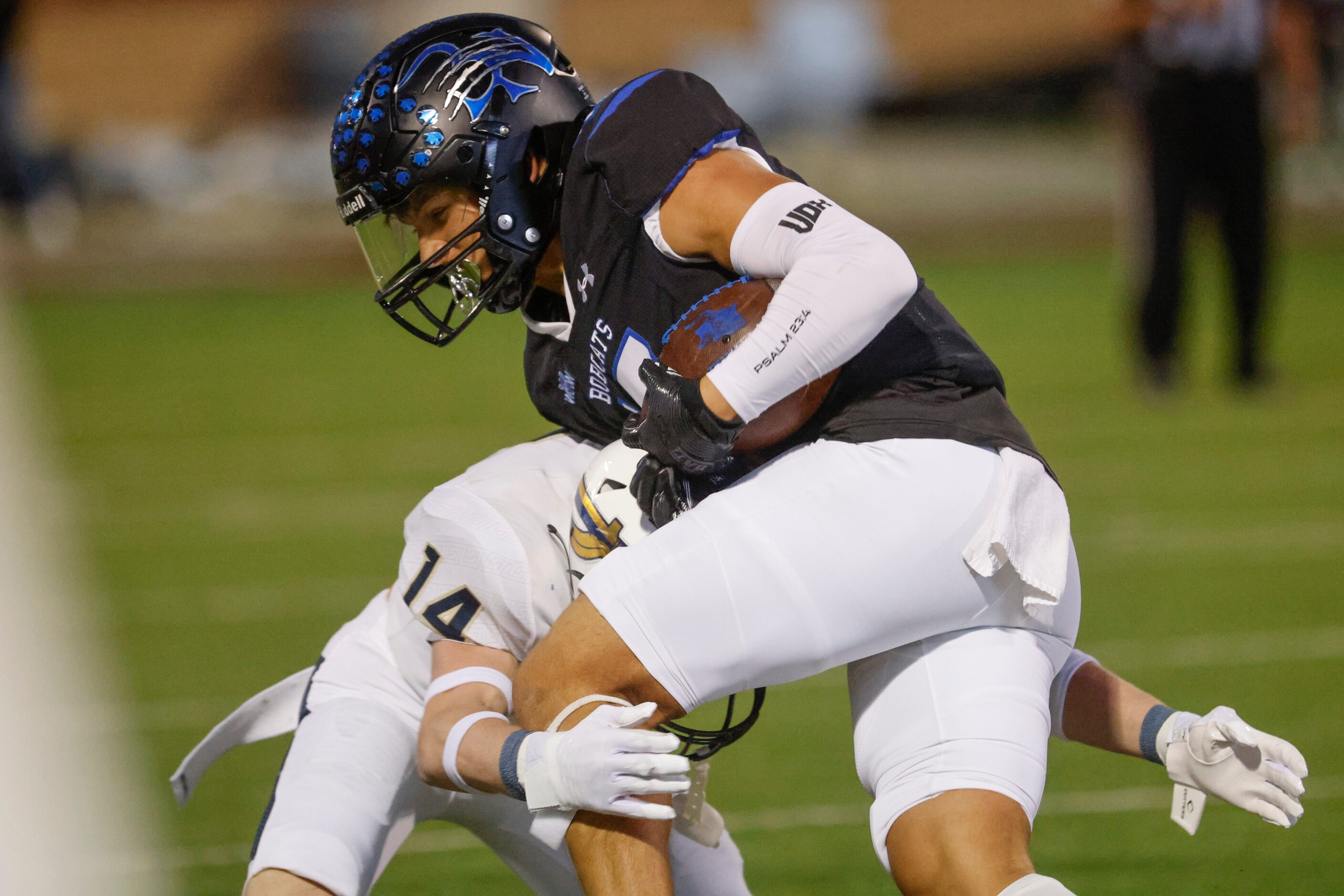 Keller High’s Baron Brown (left) tackles Byron Nelson’s Tate Reynolds during the first half...