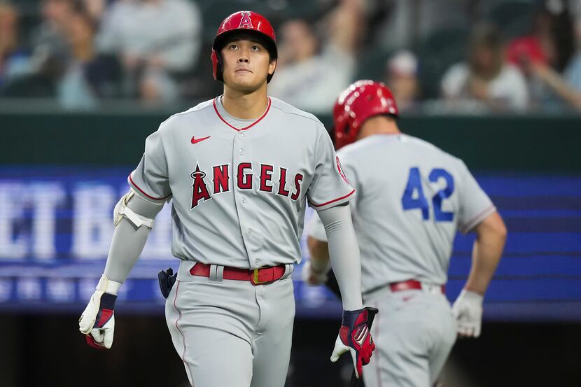 Los Angeles Angels designated hitter Shohei Ohtani reacts after striking out during the...