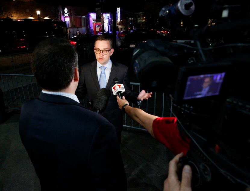 Scott Griggs talks to the media as he waited for final election results to make sure he made...