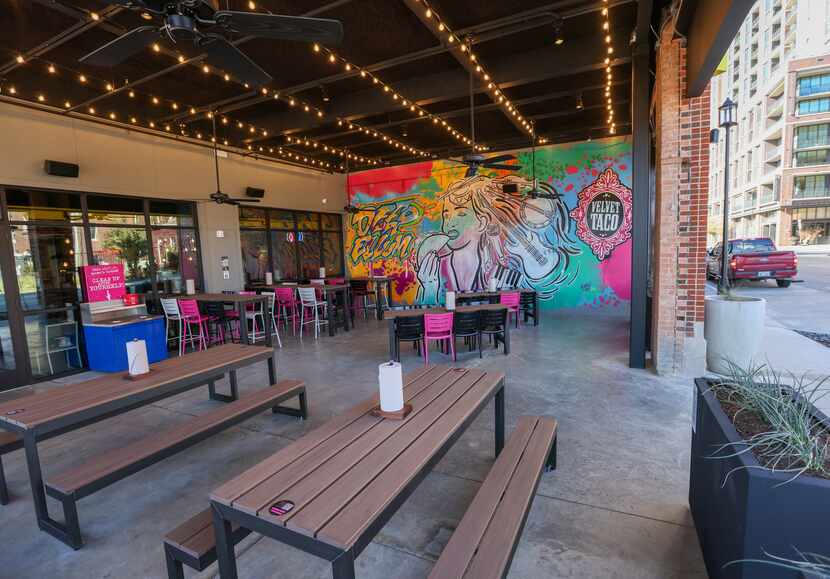 A patio marks the entrance to a Velvet Taco, the first tenants of a redeveloped block of...