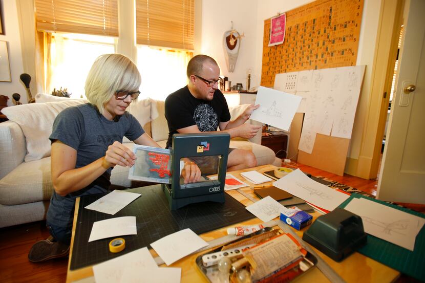 Artists Gwen McGinn and Isaac Cohen make postcards to advertise the inaugural issue of "The...