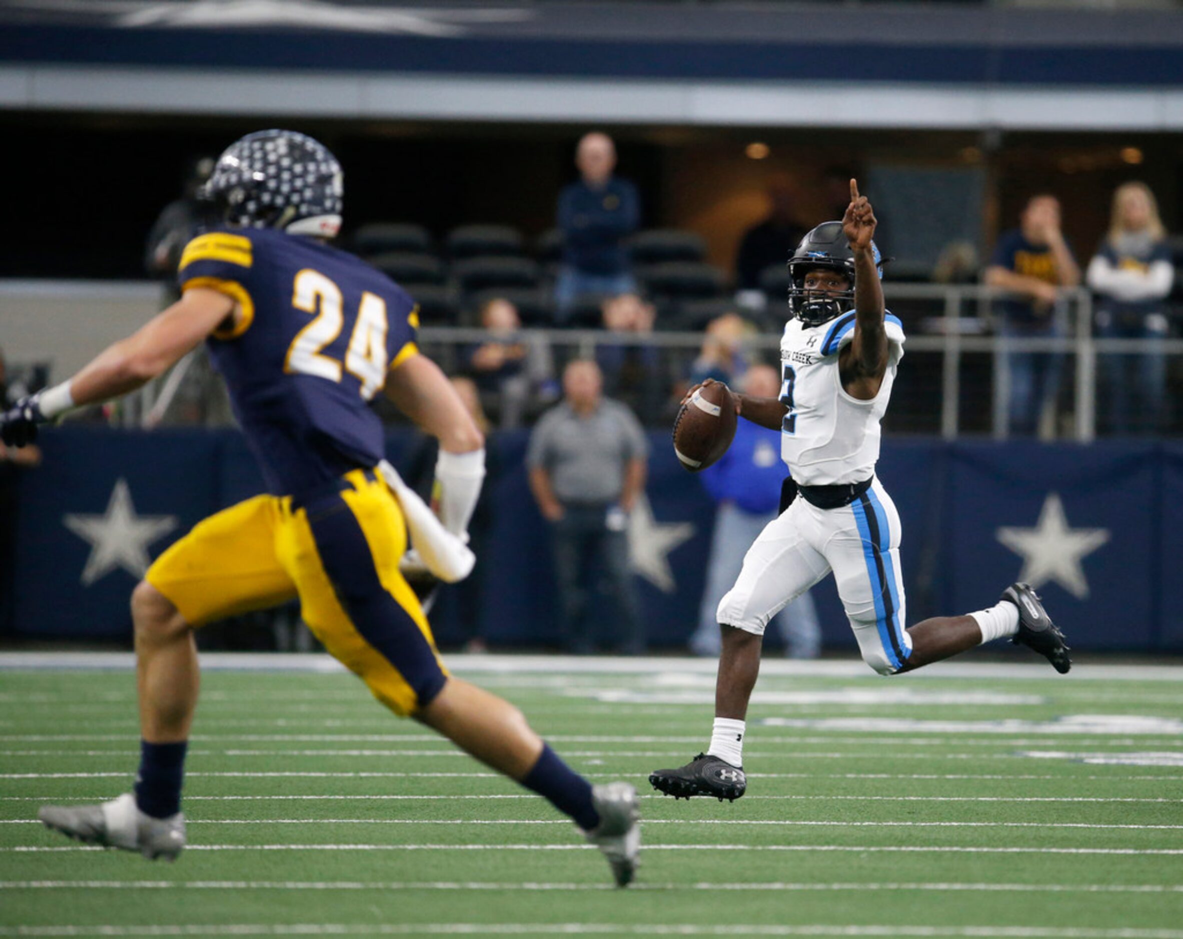 Shadow Creek's quarterback Jamarian George (2) indicated a pass in front of Highland Park's ...