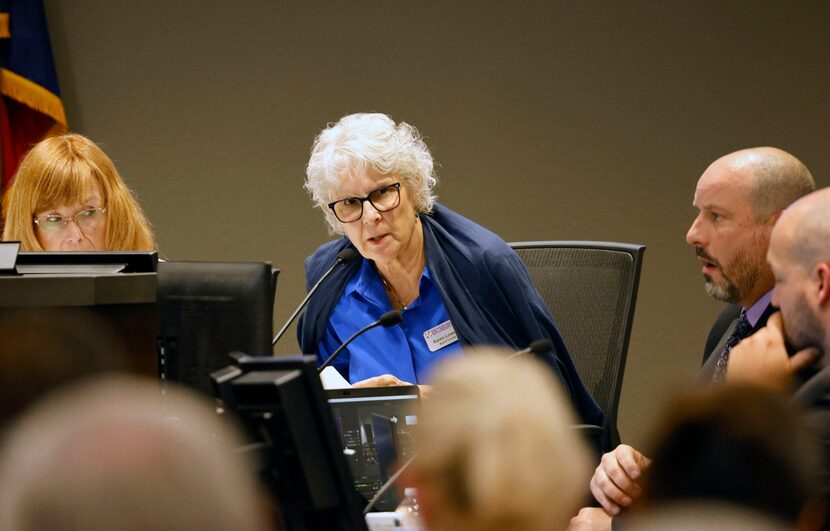 Granbury Independent School District trustee Karen Lowery, center, speaks during a special...