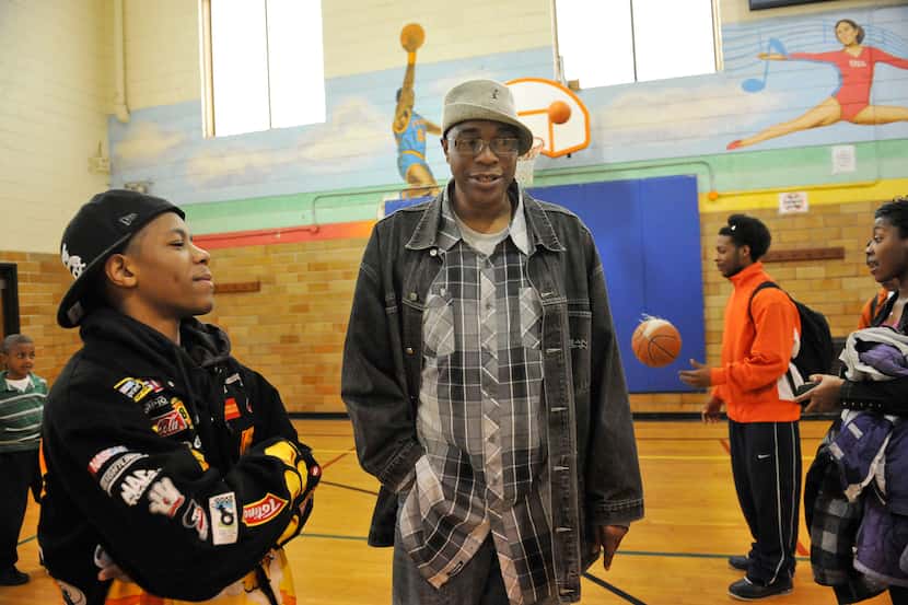 Abdul Jeelani, right, talks with Sherman Barber, left, at the Tyler Domer Community Center...