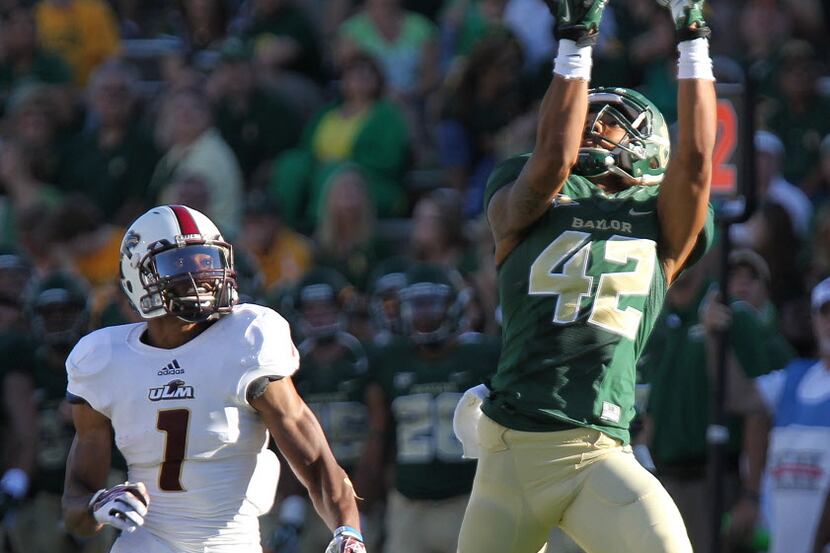Baylor wide receiver Levi Norwood (42) catches a touchdown pass against Louisiana-Monroe...