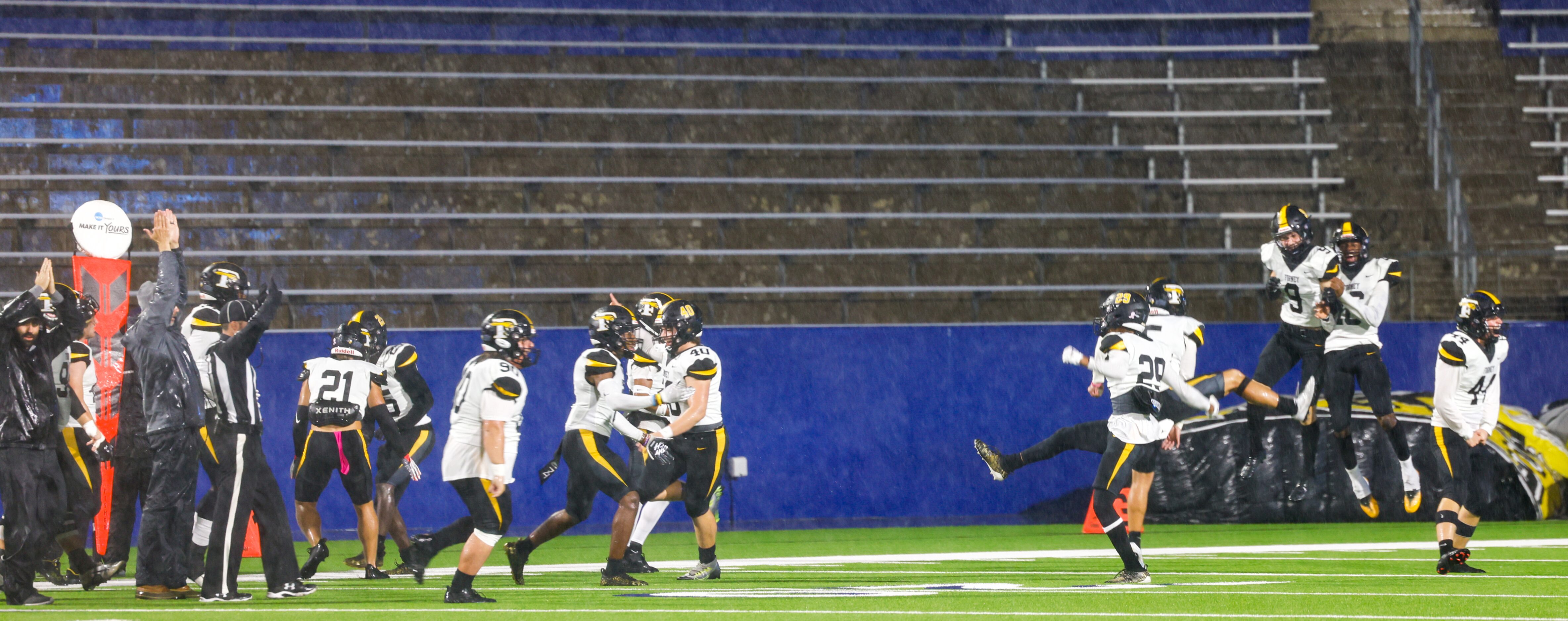 Forney celebrates a safety score from the game’s kickoff against McKinney North at the...