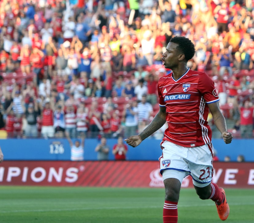 FC Dallas midfielder Kellyn Acosta (23) ignites the home crowd as he celebrates after...