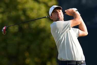 Scottie Scheffler watches his tee shot on the fifth hole during the second round of the U.S....