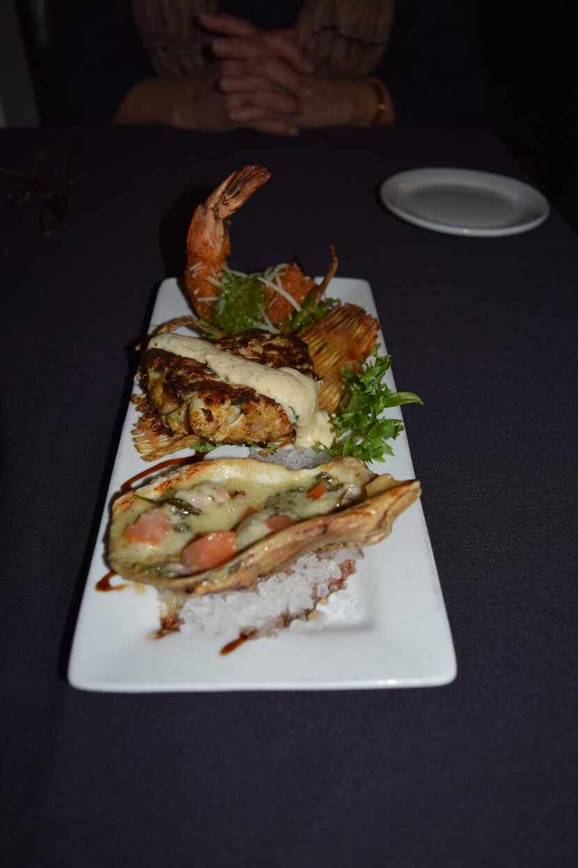 Chef Caleb Bass  of Roosevelt’s offers a starter with crab cake, Italian herb-crusted jumbo...