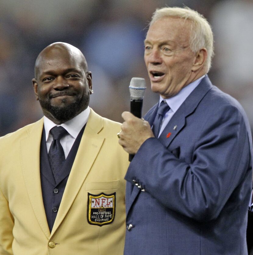 Former Dallas RB Emmitt Smith, left, and owner Jerry Jones are pictured at halftime during...