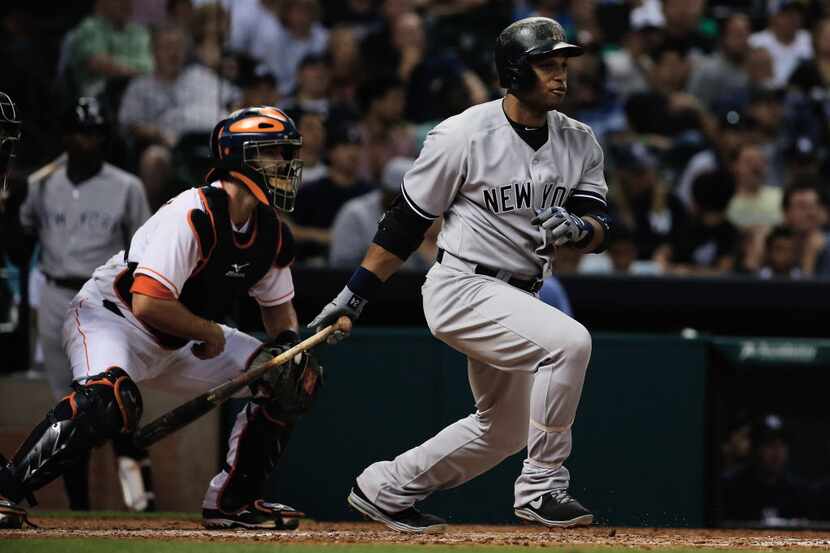 HOUSTON, TX - SEPTEMBER 28:  Robinson Cano #24 of the New York Yankees hits a single in the...