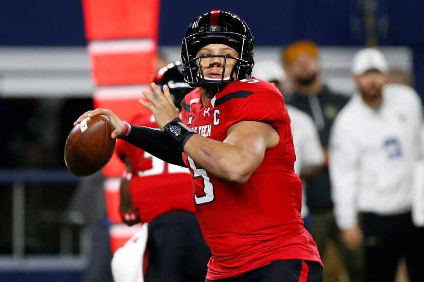 Texas Tech quarterback Patrick Mahomes II (5) looks to throw against Baylor during the first...