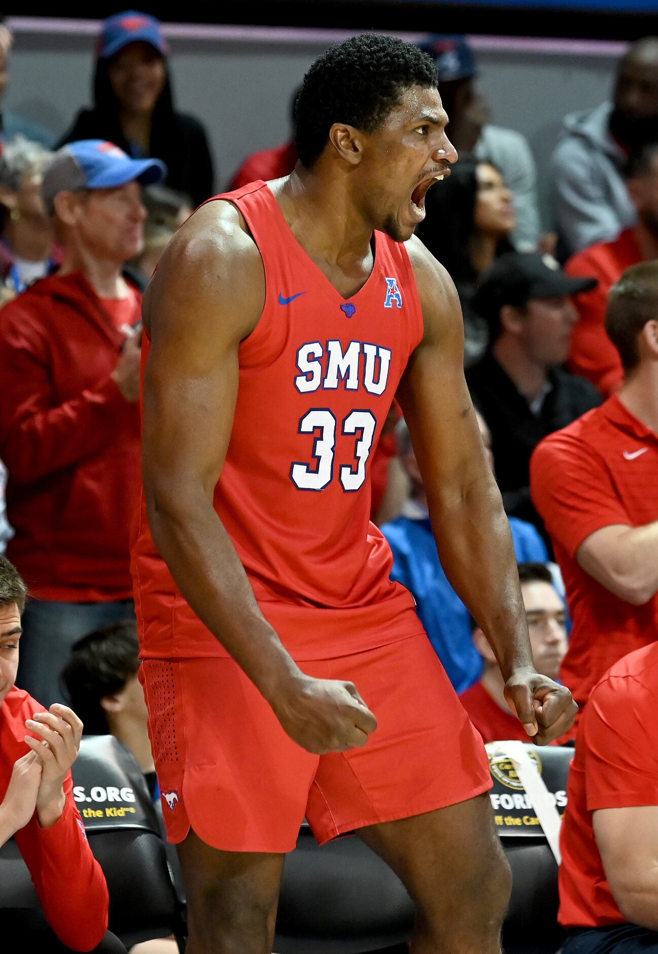 SMU forward Franklin Agunanne (33) reacts to a play in the second half during a men’s NCAA...