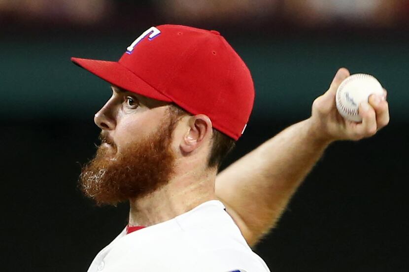 Texas Rangers closing pitcher Sam Dyson (47) pitches in the ninth inning during a Major...
