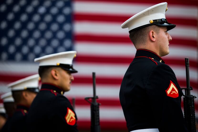 U.S. Marines prepare to give a 21-gun salute during a ceremony before the 2017 Greater...